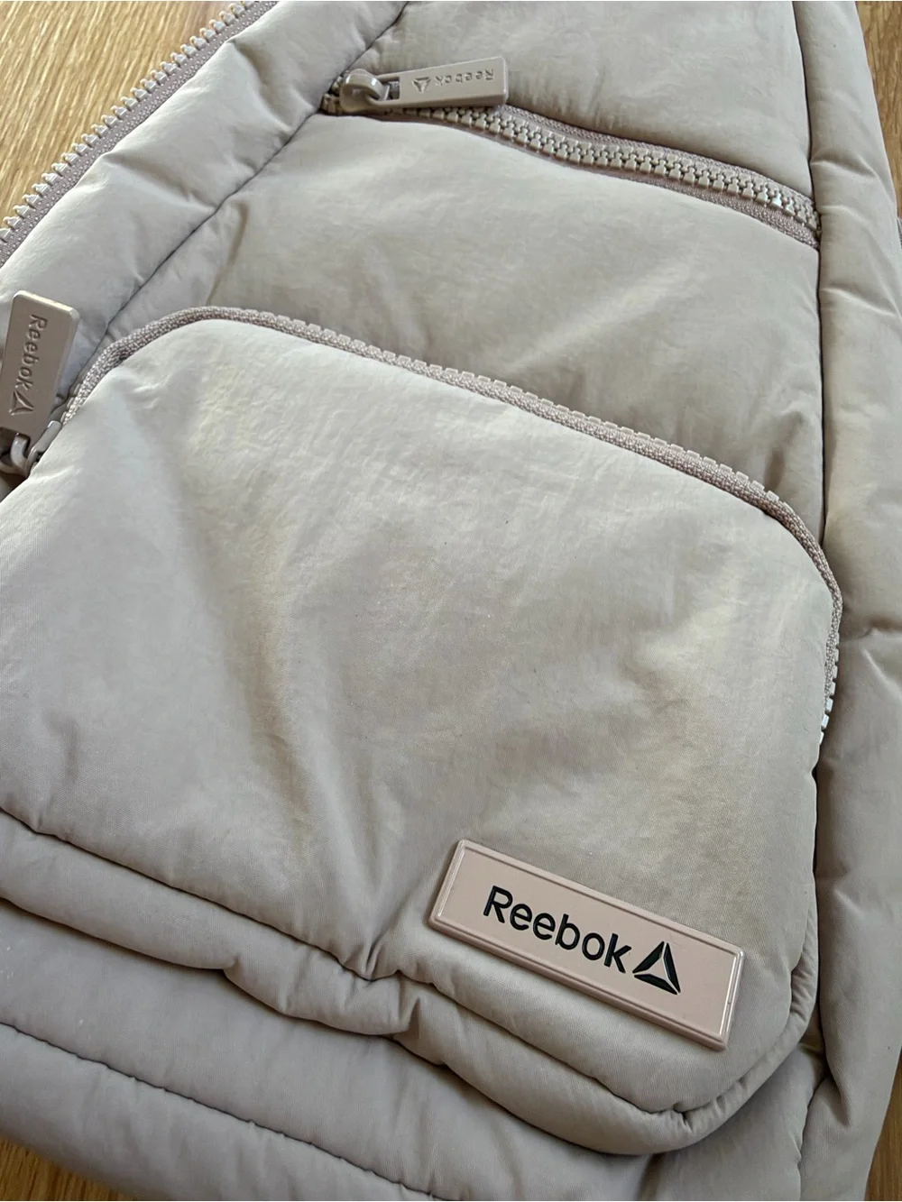 Reebok Women’s Maeve Pale Pink Convertible Crossbody Sling Backpack (Mocha)